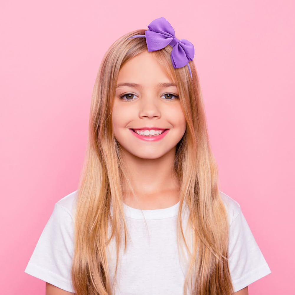 Bekecidi pom-pom hair rope adds playful accents.