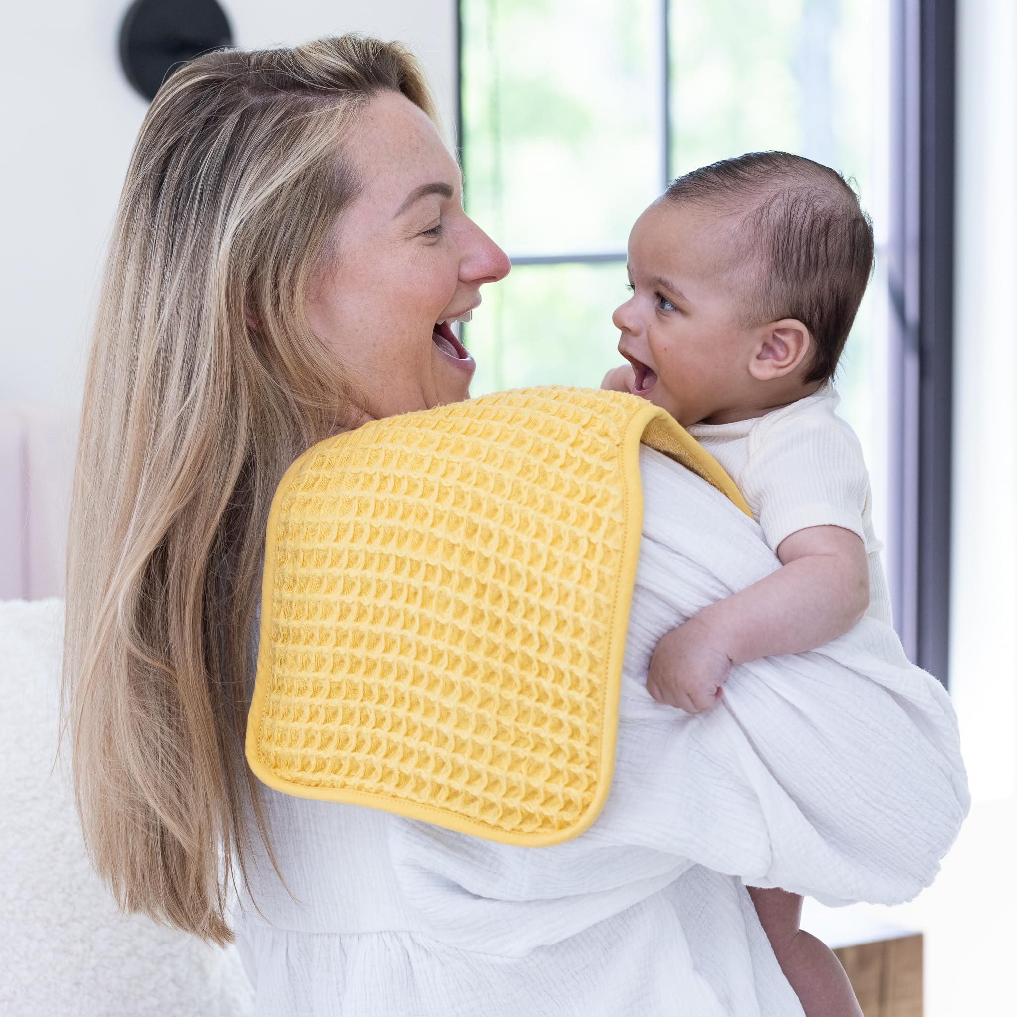 Bella Tunno reversible bib with snap closure, adjustable fit as baby grows