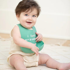 Bella Tunno I Love Grandma bib pocket catches crumbs and drips.