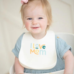 Deep food catcher pocket on Bella Tunno I Love Mom bib catches crumbs