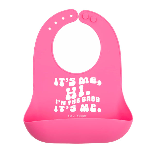 Bella Tunno It’s Me Hi bib with pocket open, catching crumbs during meals