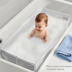Bella's Friends baby collapsible tub with slip-resistant base for stable bathing.