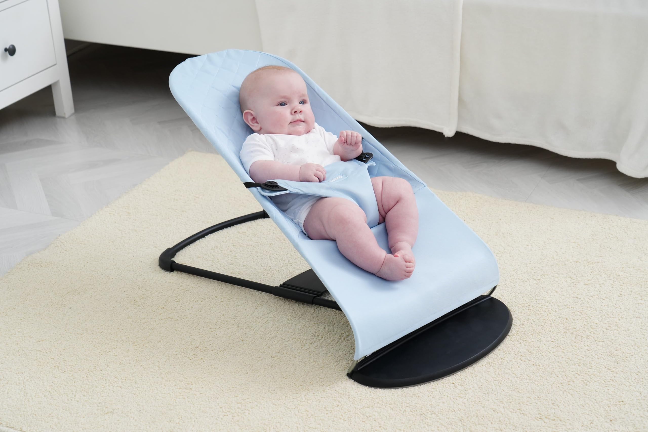 Belltop seat cover lets you swap fabrics and extend the bouncer's life