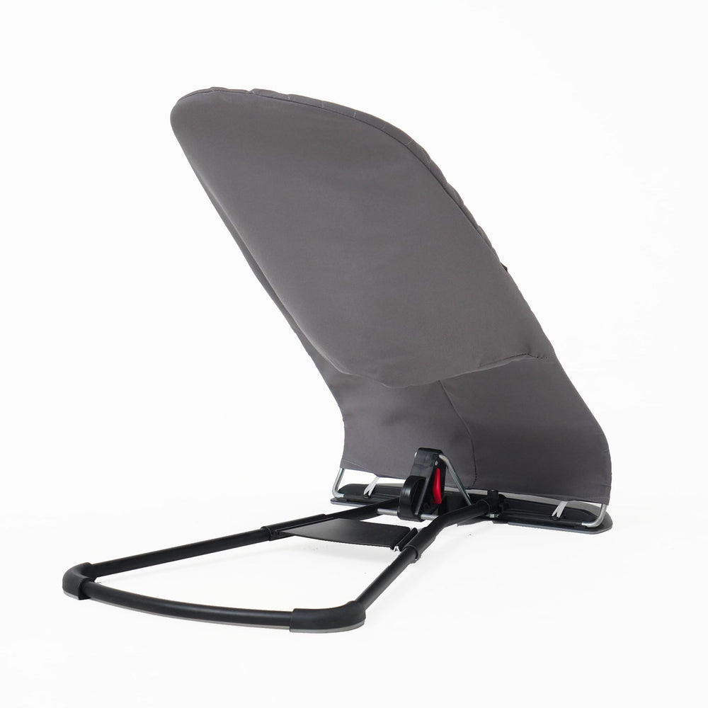 Belltop fabric seat demonstrates compatibility with BabyBjörn bouncers for secure fit.