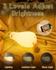BemeedLigt lying-flat duck glow sits securely on a bedside table.