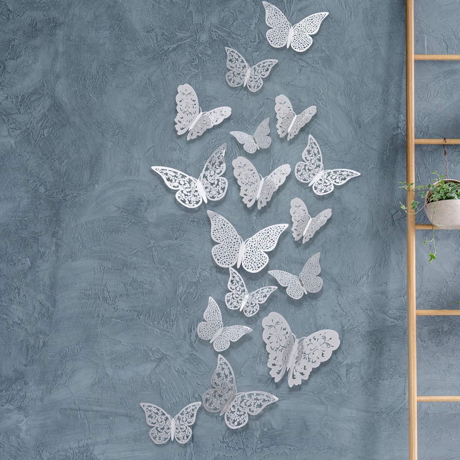 Bememo butterfly decals demonstrating glittery charm on windows and mirrors.