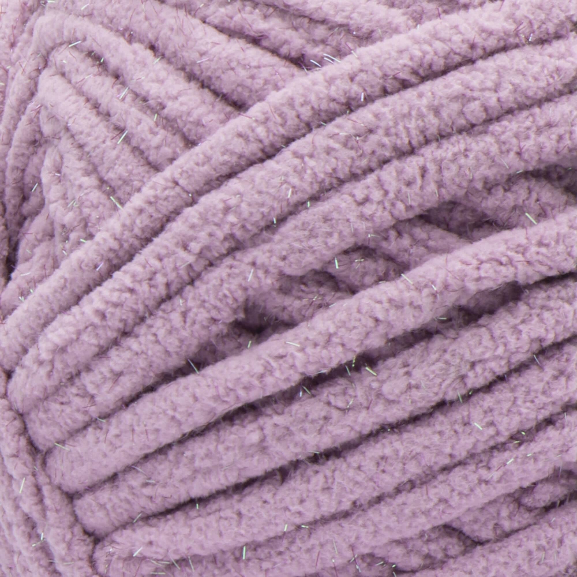 Bernat Baby Blanket Sparkle Planetary Purple Sparkle yarn spool ideal for quick, sparkle rich home projects