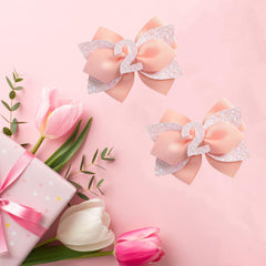 Besaleck peach-pink sprinkle bow for birthday styling.
