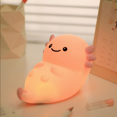 Bestfaith pink axolotl night light on table with soft bedtime glow