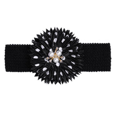 BESZANA black flower headband adds contrast and keeps style intact.