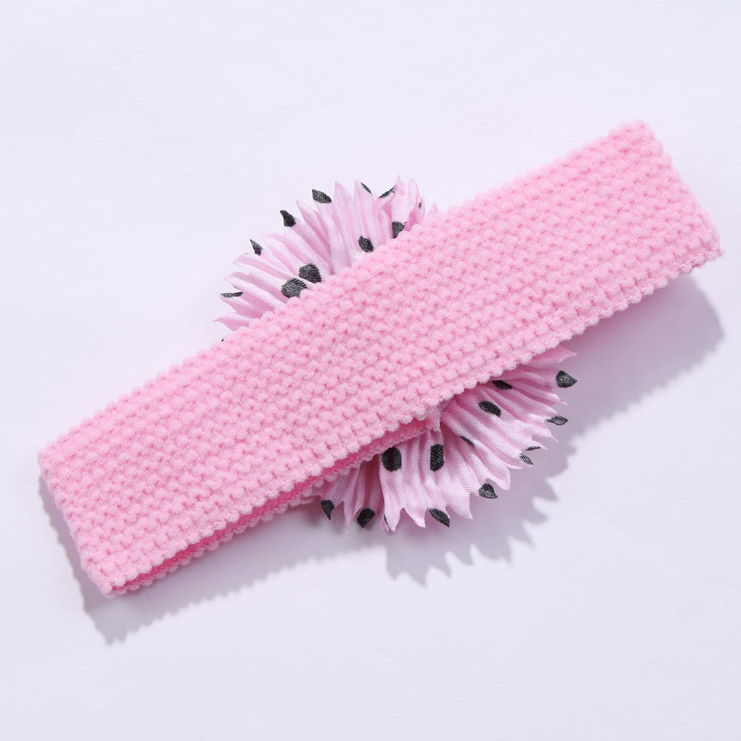 BESZANA headband close-up shows flower embellishment with delicate detailing.
