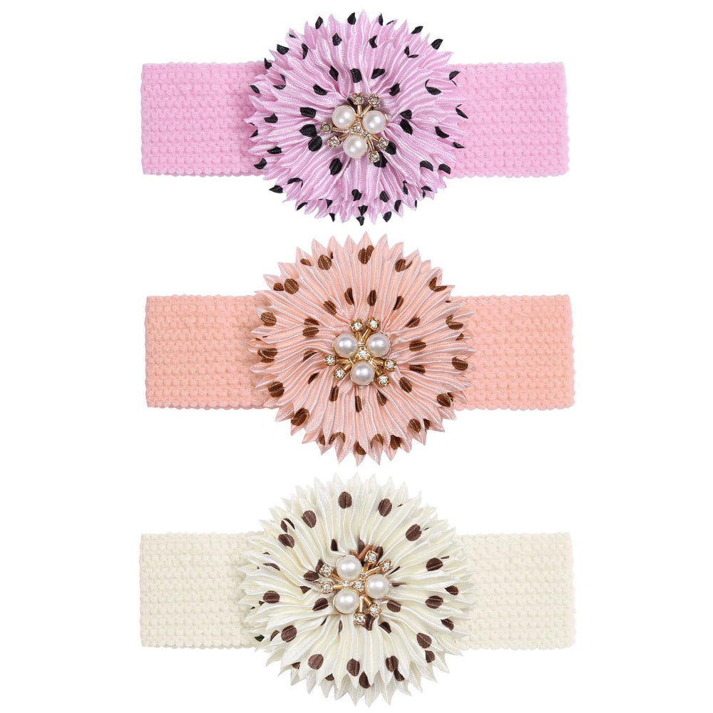 BESZANA headband on infant; secure fit during playtime.