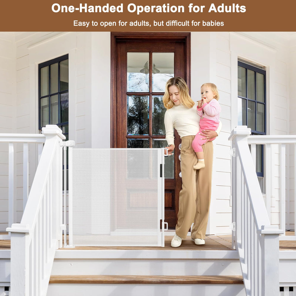 White outdoor gate installed on a patio, ideal for pets and children.