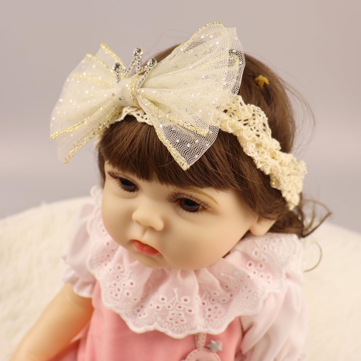 Bethynas family photos headband enhances portraits with lace detail.