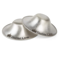 BETTERLINE silver nursing cups in hand show comfortable fit for everyday nursing