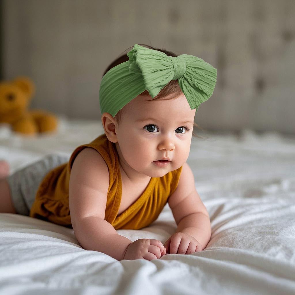 Packaging and care info for BEWDIO green toddler bow headband rust