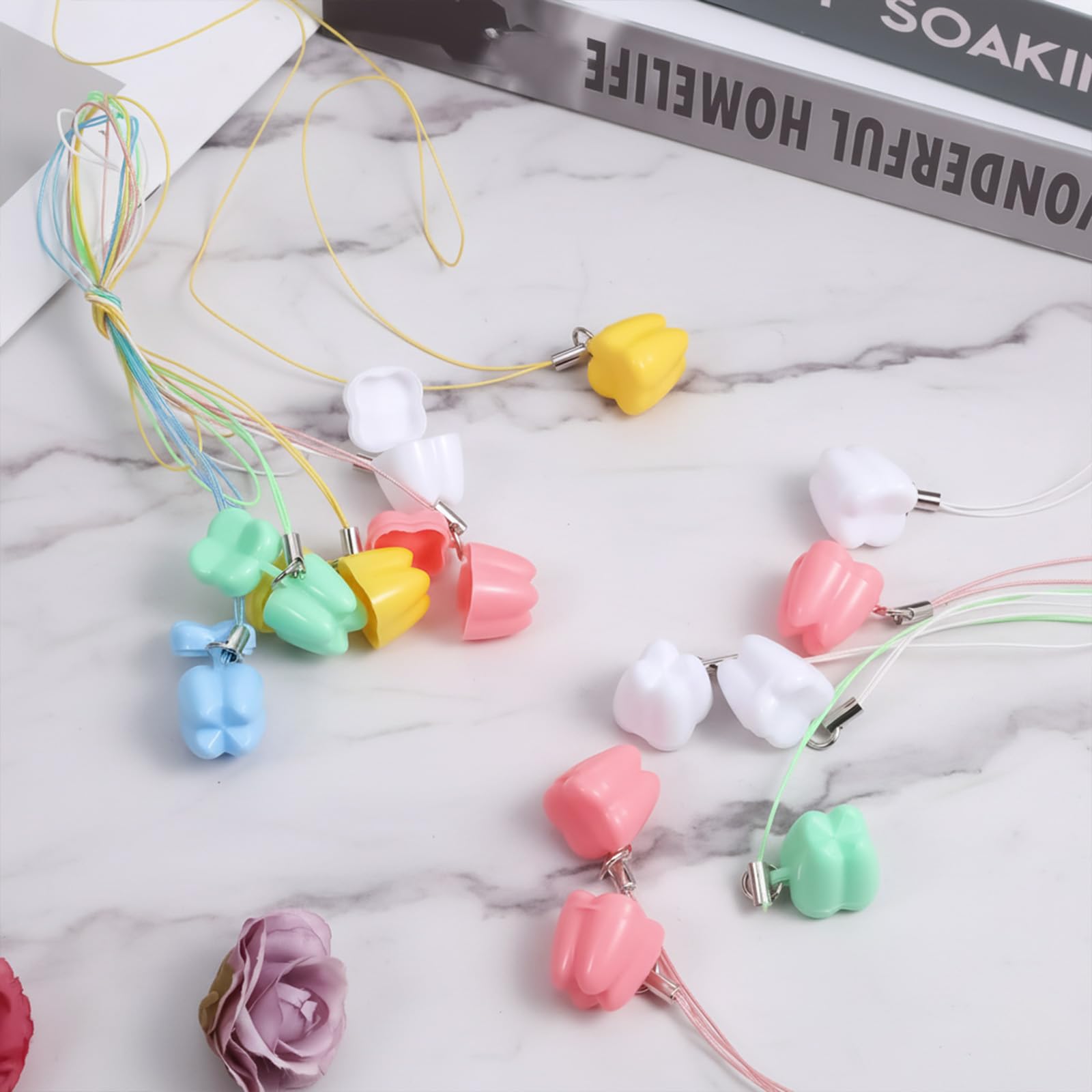 Bewudy tooth fairy necklace in blue color supports easy tooth organization.