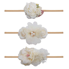 BFNAAgirl floral headband with soft material for gentle skin contact.