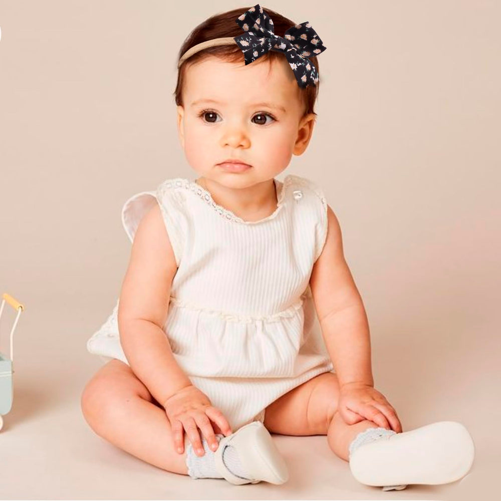 BFNAAgirl flower-collection headband on a lightweight nylon elastic band