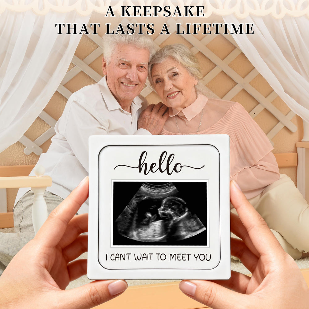 BGFMVS pregnancy announcement board shares joyful news with family.