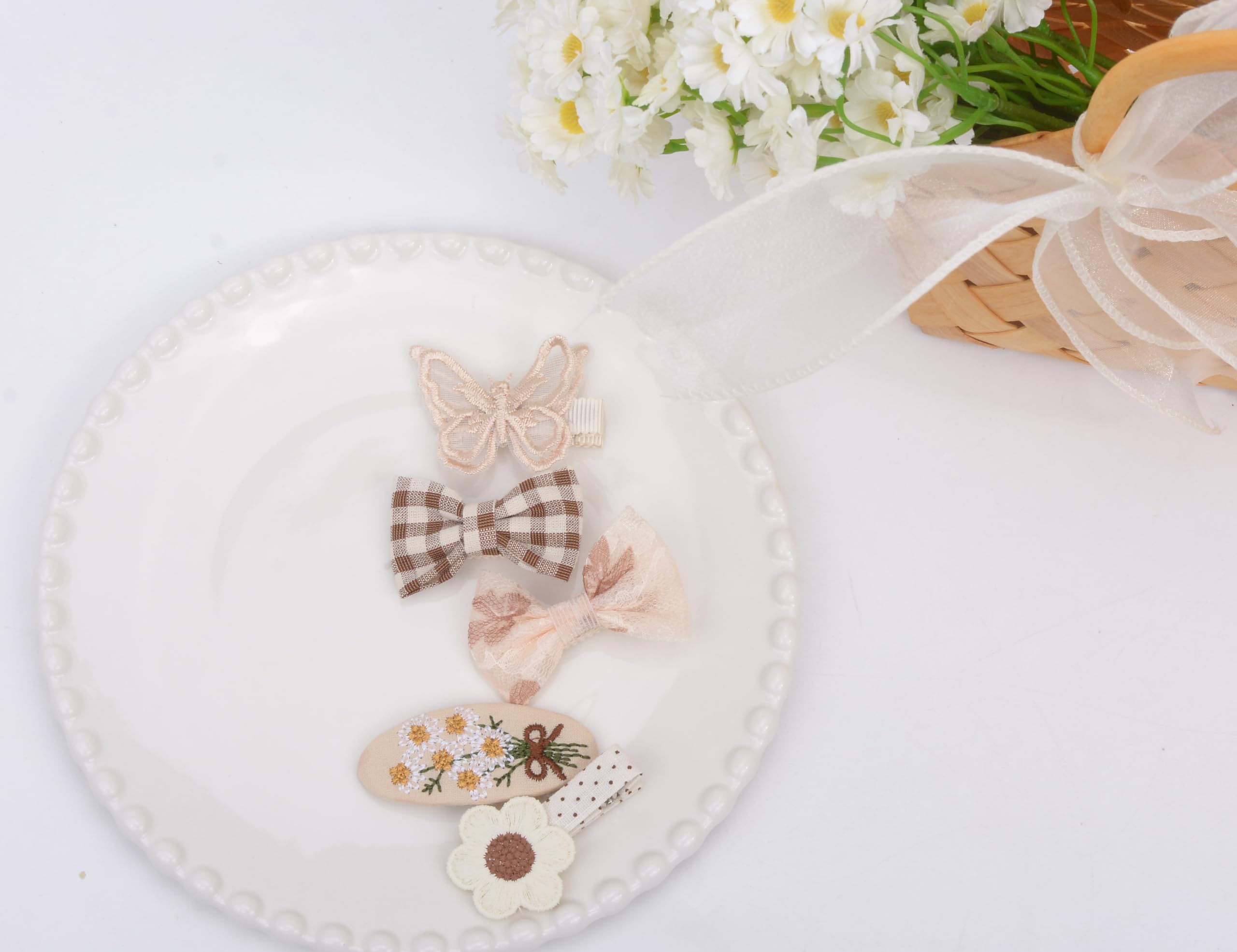 BIANHUAN designs feature felt, lace, and grosgrain details for cute accents.