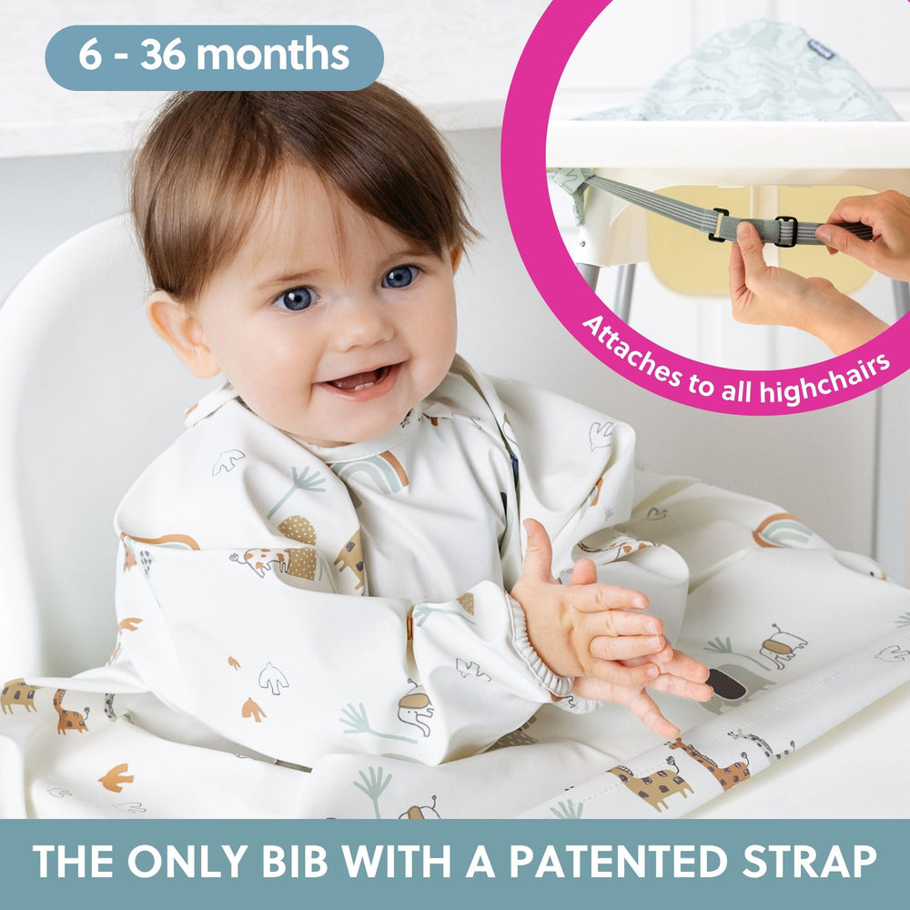 BIBaDO long sleeve bib on a toddler protects clothes from spills.