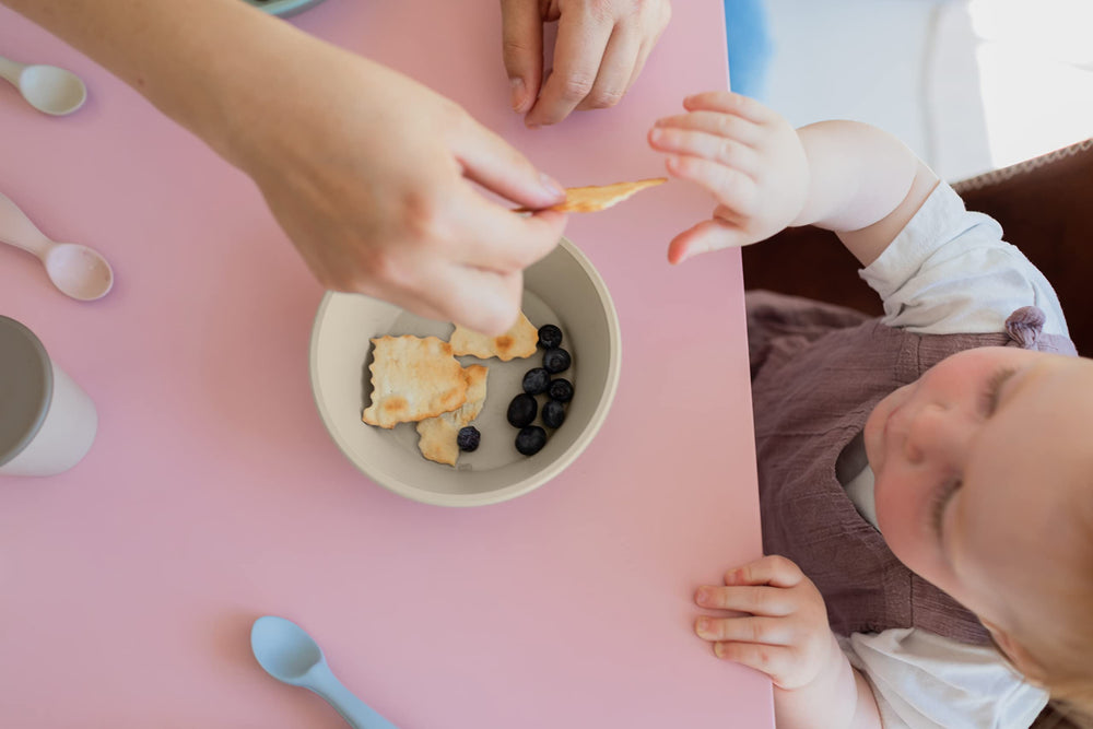BIBS cup set supports baby and toddler self-feeding routines.