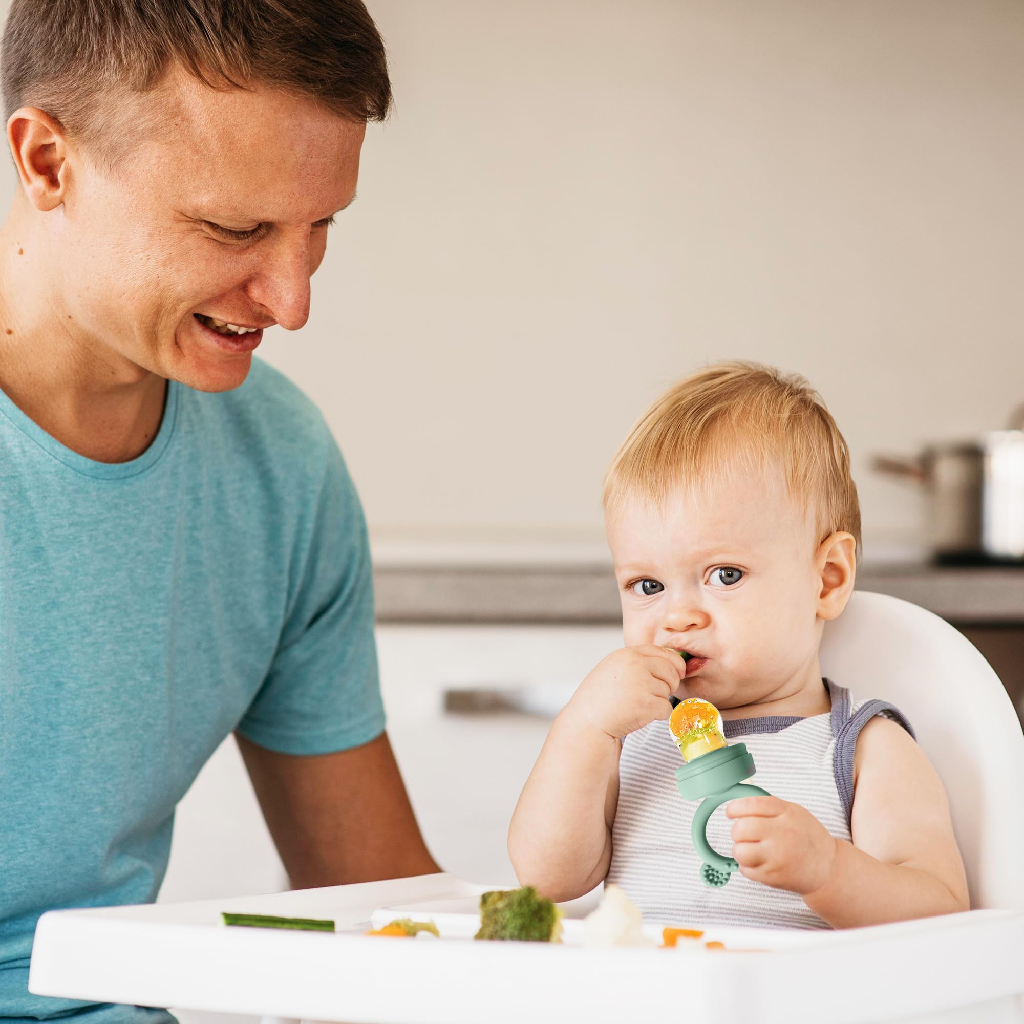 BIGSPINACH silicone feeder handle; gentle bite-friendly teether for babies.