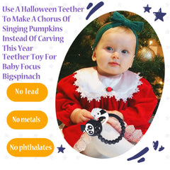 BIGSPINACH teether with grim reaper charm textured for soothing gums during teething.