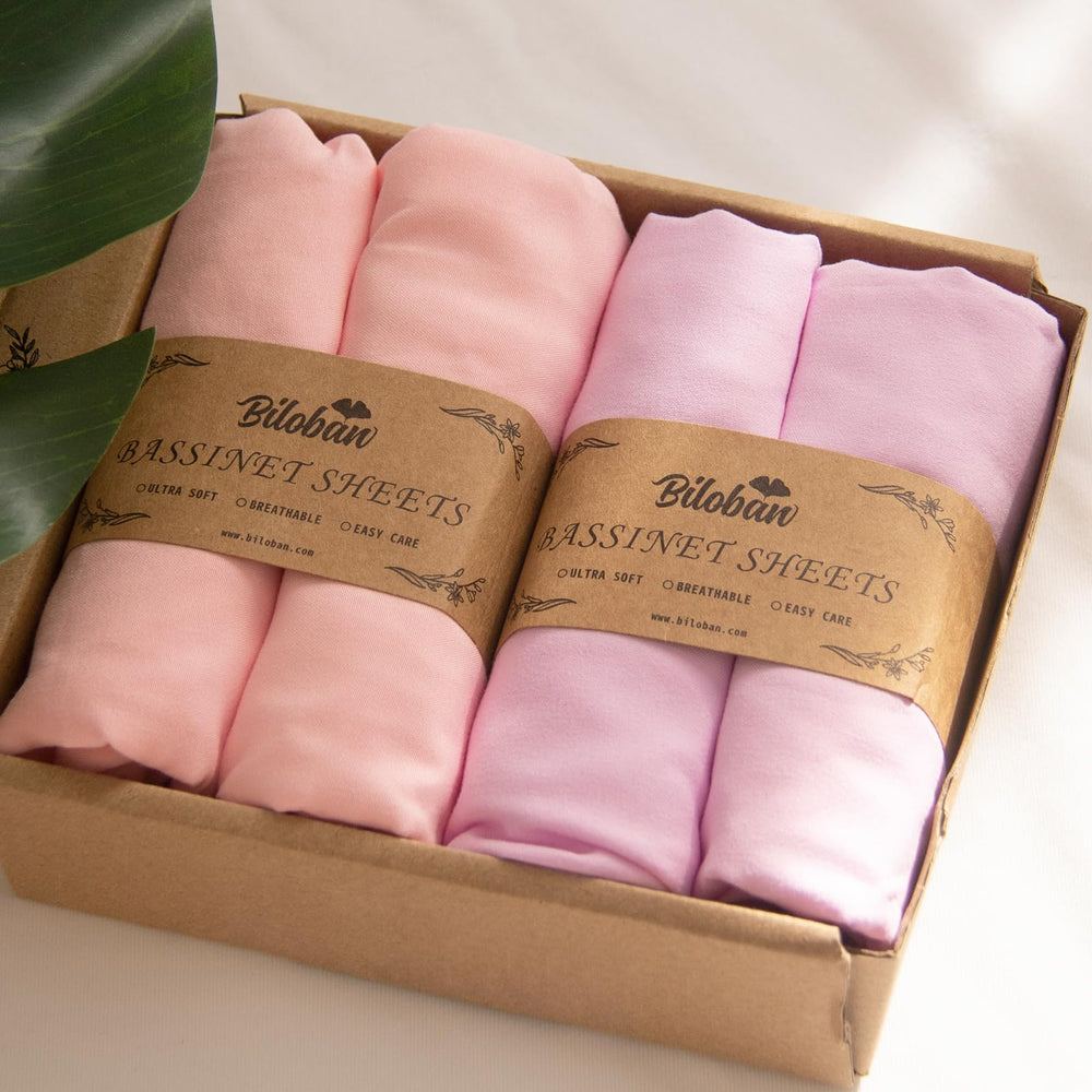 Biloban baby bassinet sheets 4-pack with elastic edge for secure fit and quiet nights.