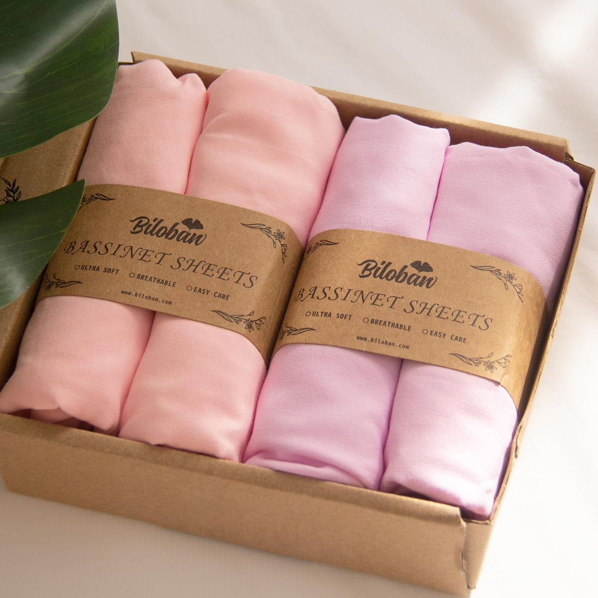Biloban baby bassinet sheets 4-pack with elastic edge for secure fit and quiet nights.