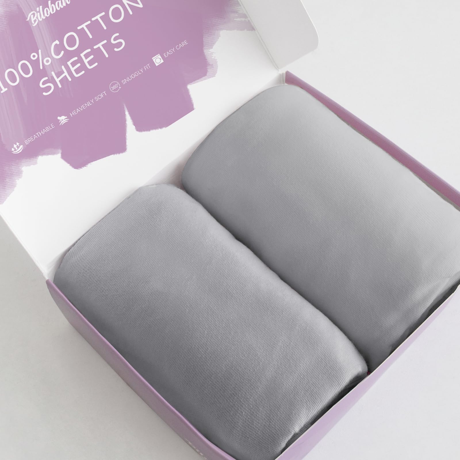 Biloban bassinet sheet on angelbliss crib demonstrates snug fit and soft cotton.