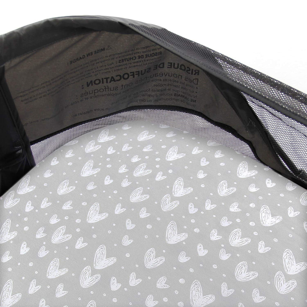 Gray print Biloban sheet adds a neutral, stylish touch to travel setups.