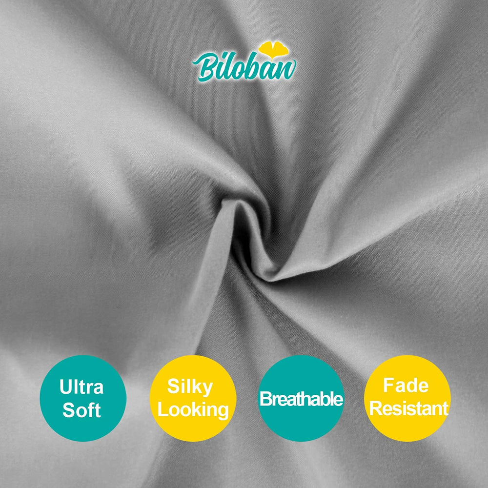 Biloban 14-inch drop fits standard crib frames for clean coverage.