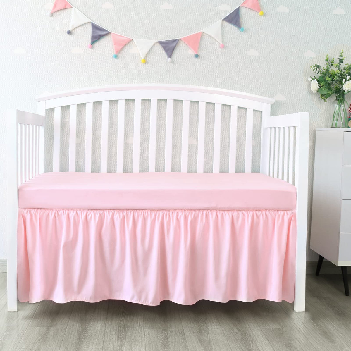 Biloban crib skirt pleated pink 14-drop fits standard cribs for neat, floor-length coverage.