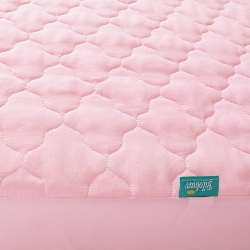 Deep skirt with elastic ensures a secure fit on 52x28 mattresses.