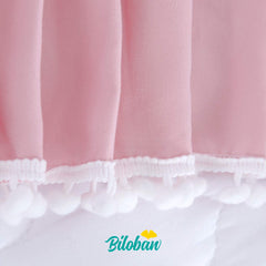 Biloban pink dust-ruffled crib skirt adds soft, polished nursery look