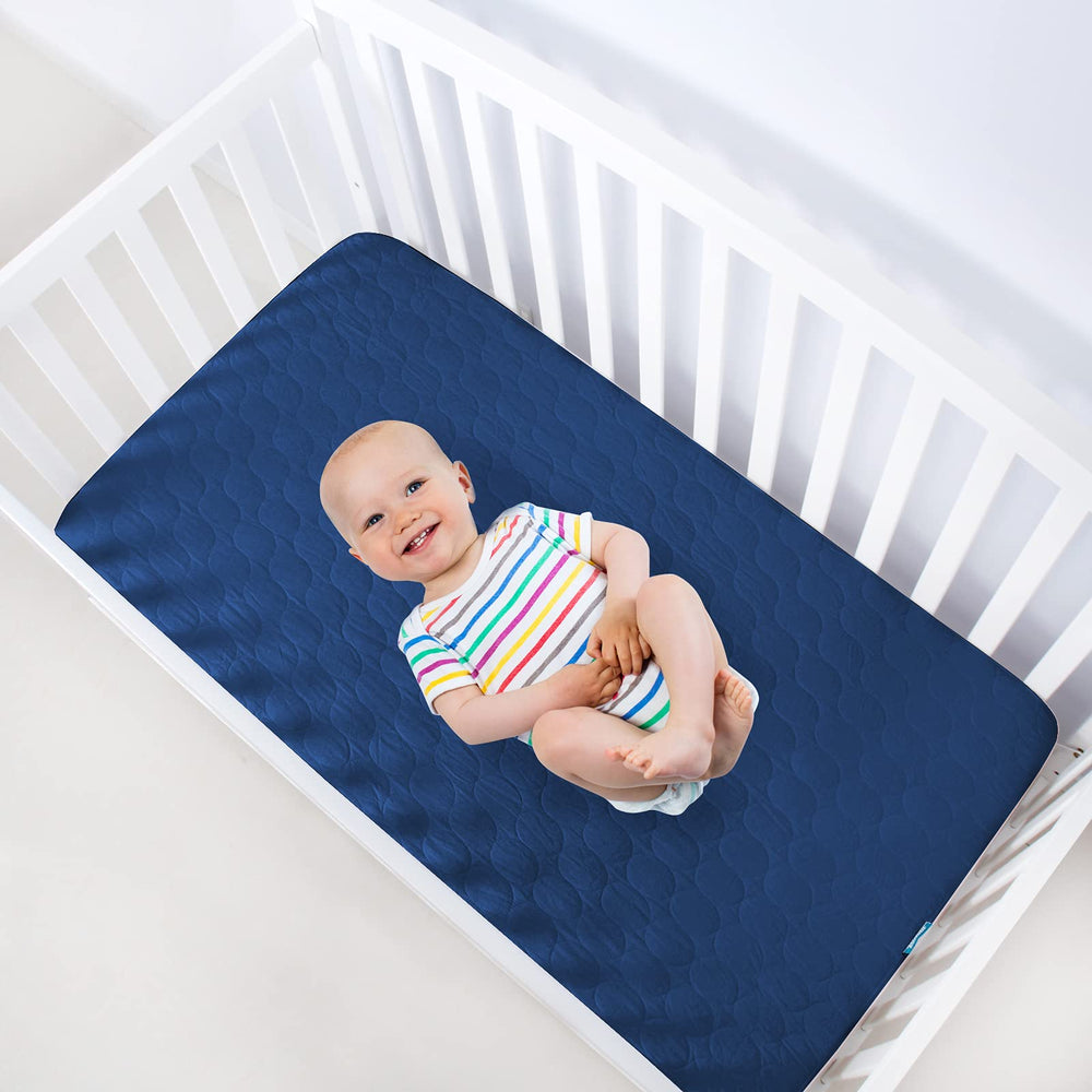 Biloban protector fits standard crib mattresses 28 x 52 x 5 inches.