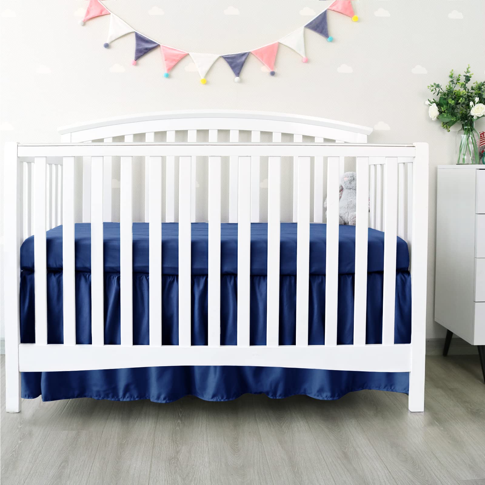 Biloban four corner buttons secure the fit without lifting the mattress.