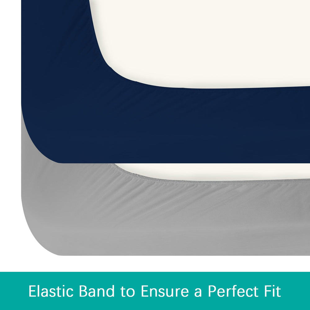 Biloban gray navy bedding set offers gender-neutral style for nursery décor.