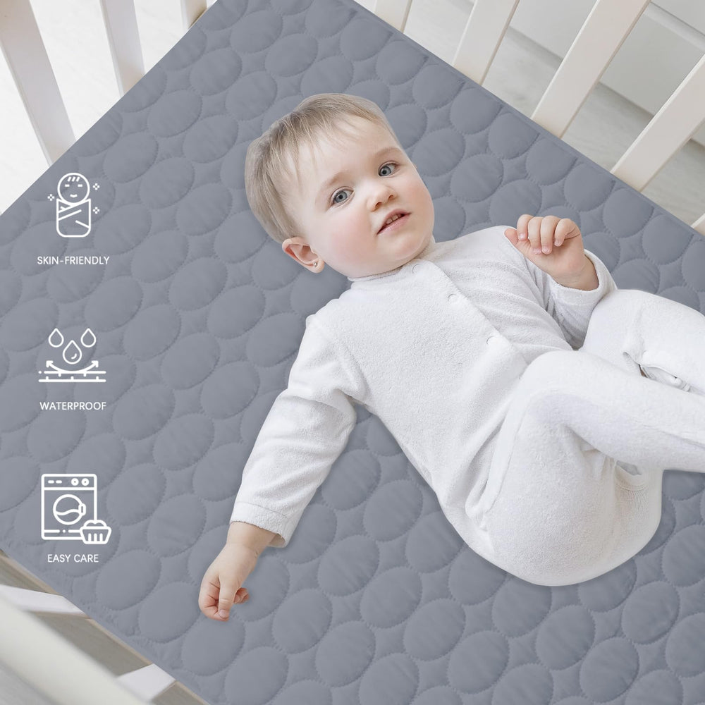 Biloban machine washable crib pad for simple, quick cleanups