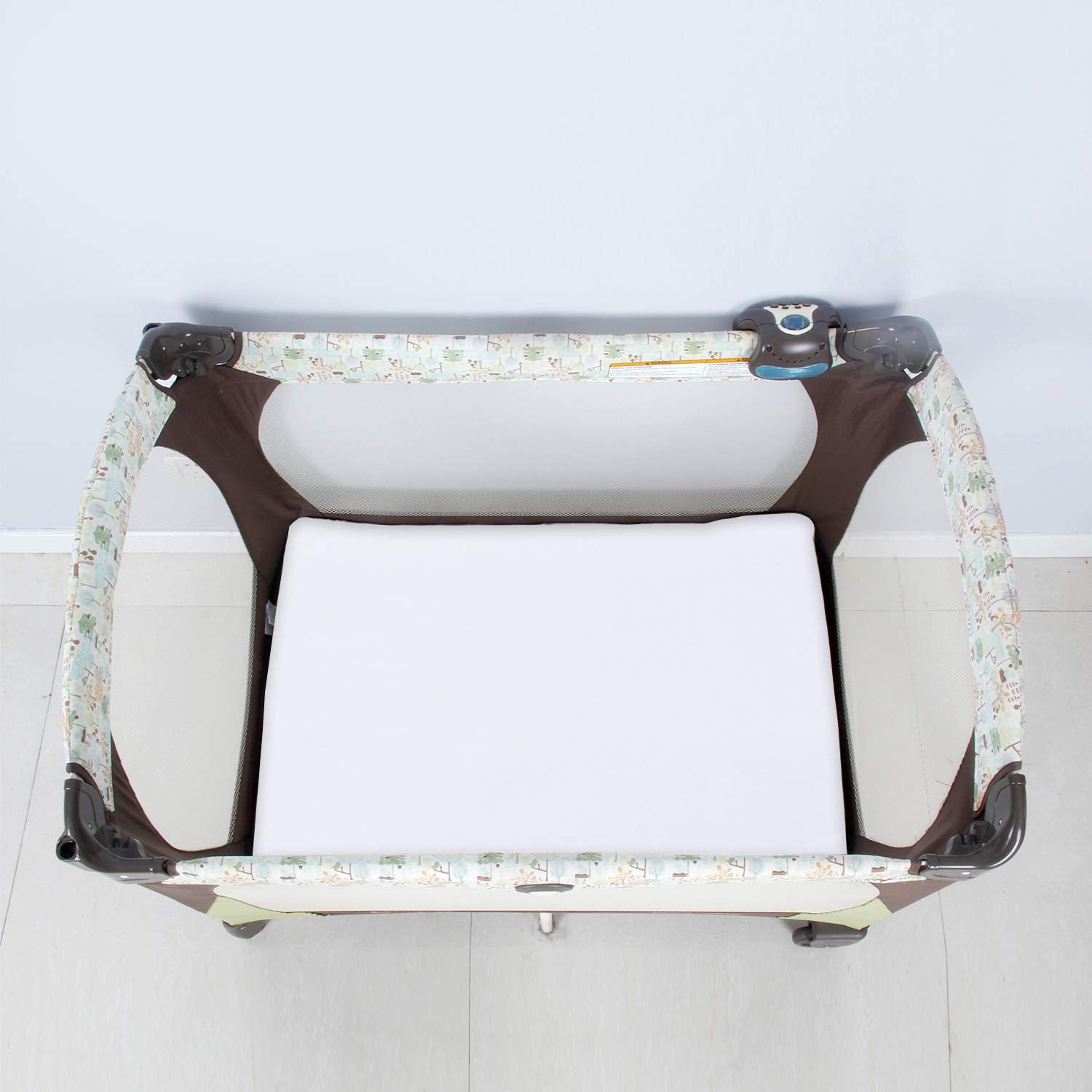 Biloban mini crib mattress fit offers snug, flat surface for peaceful naps.