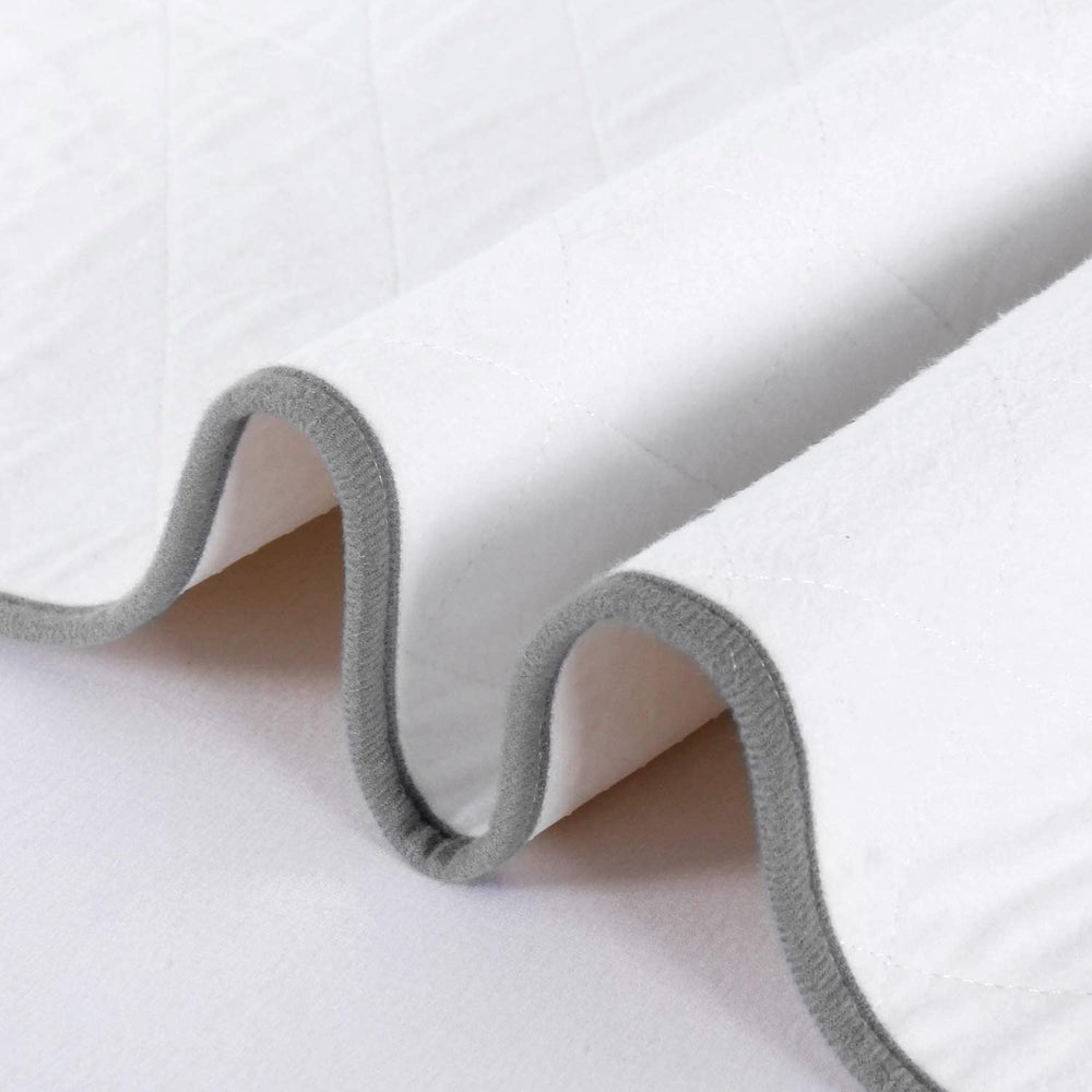 Biloban multi-use protector suitable for bed, car seat, and pet areas.