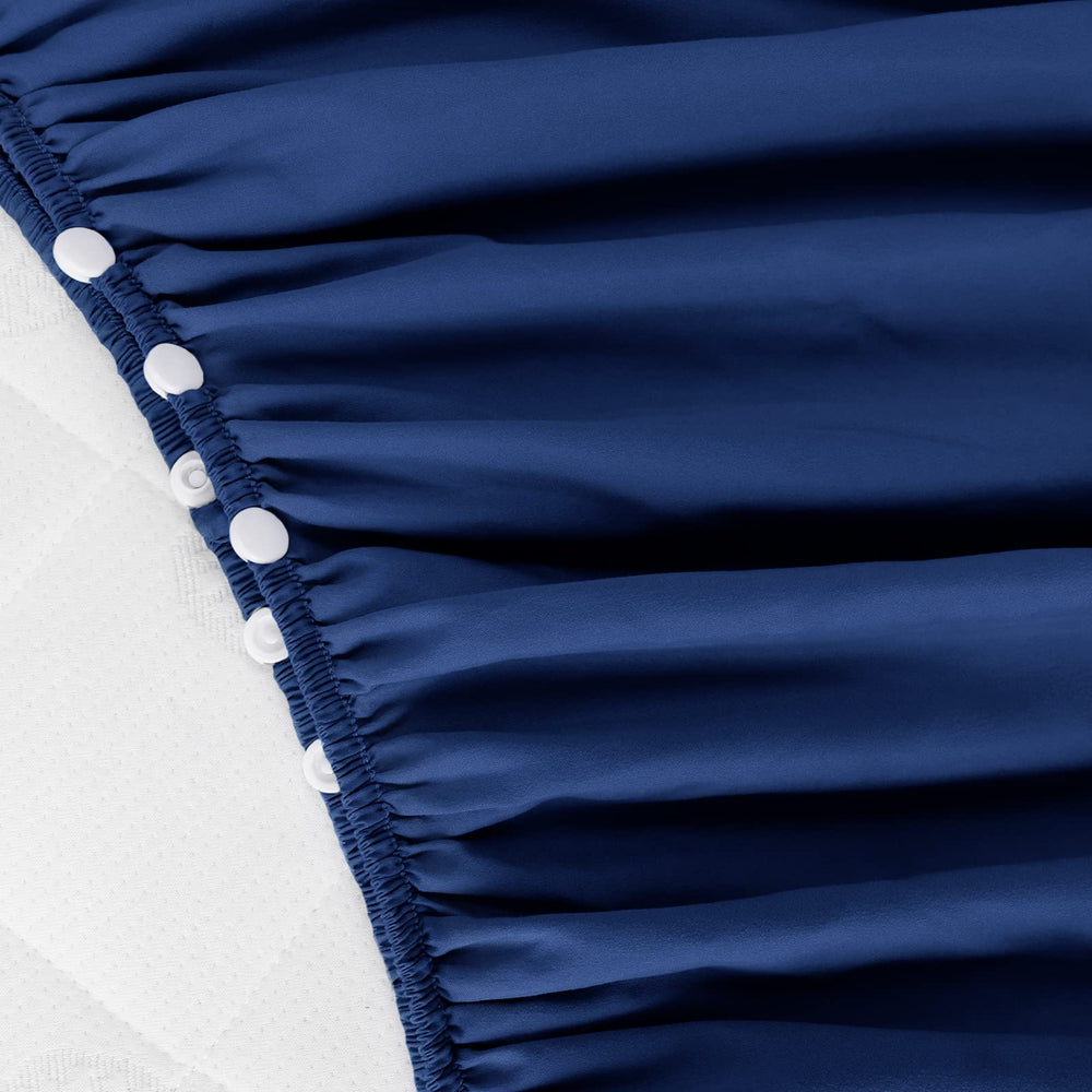 Biloban navy dust ruffle showcases easy-care microfiber and machine-washable design.