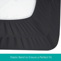 Machine-washable Biloban sheet keeps mini crib or playard tidy.