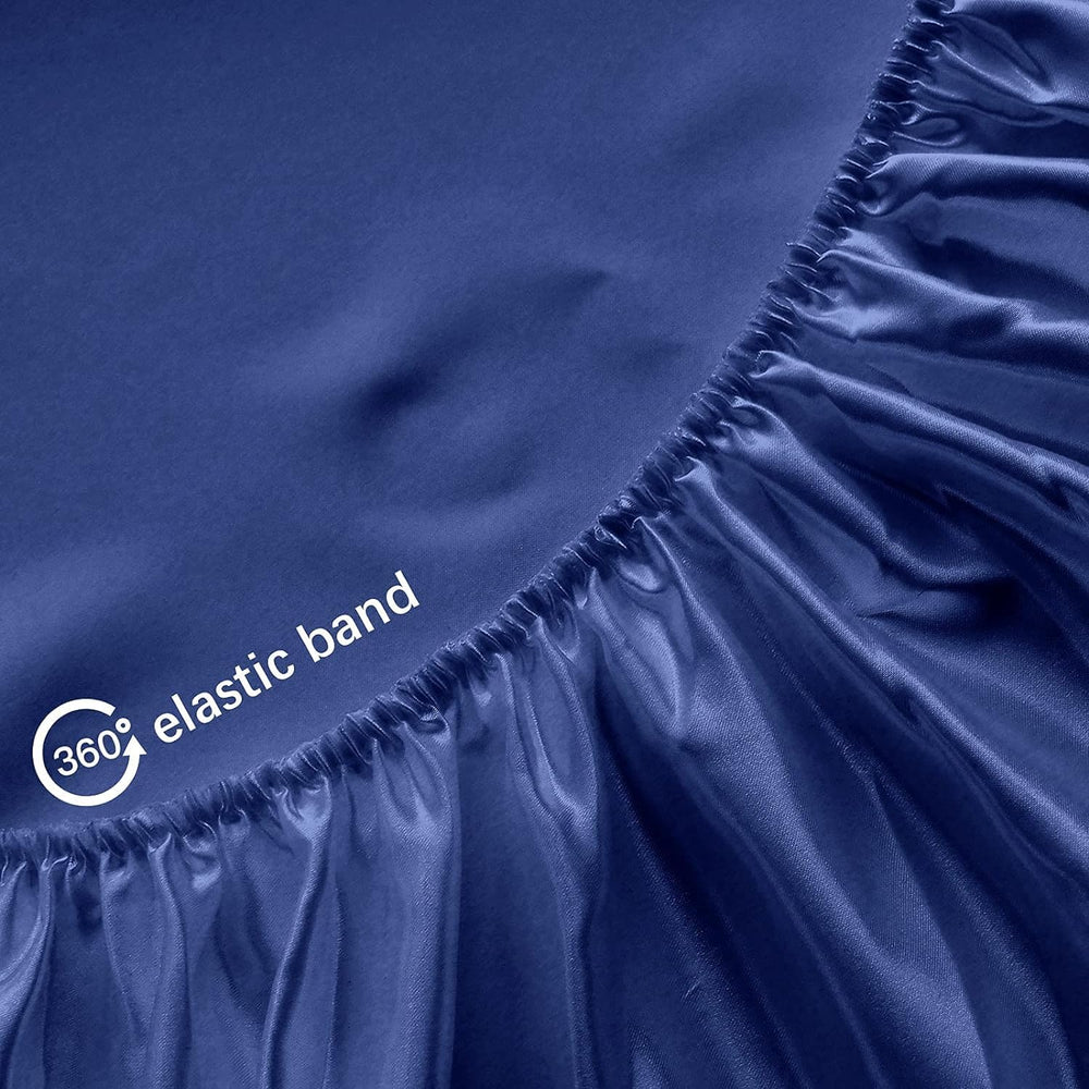 Biloban satin mini crib sheet with elastic snug fit on a mini crib