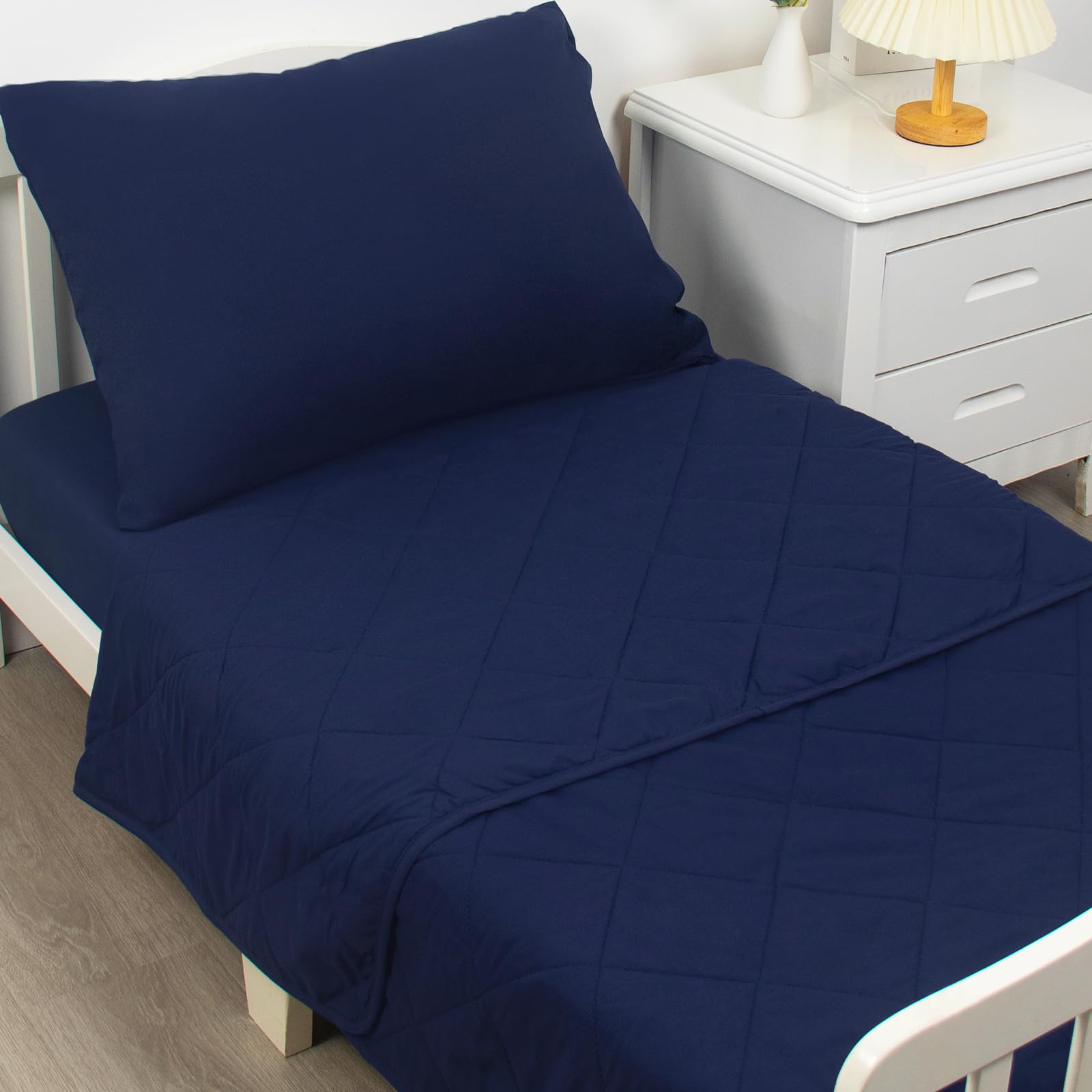 Biloban flat sheet on toddler bed highlights breathable microfiber comfort