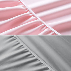 Biloban ultra-soft microfiber sheet in grey and pink offers cozy baby comfort.
