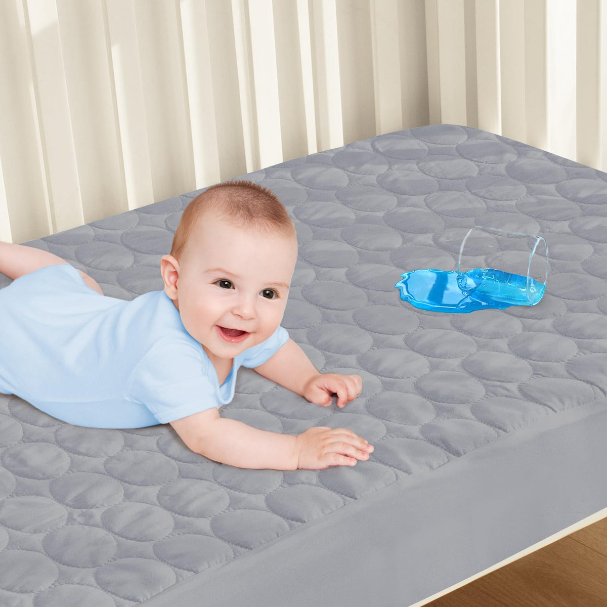 Biloban waterproof crib mattress pad keeps baby dry through nightly spills