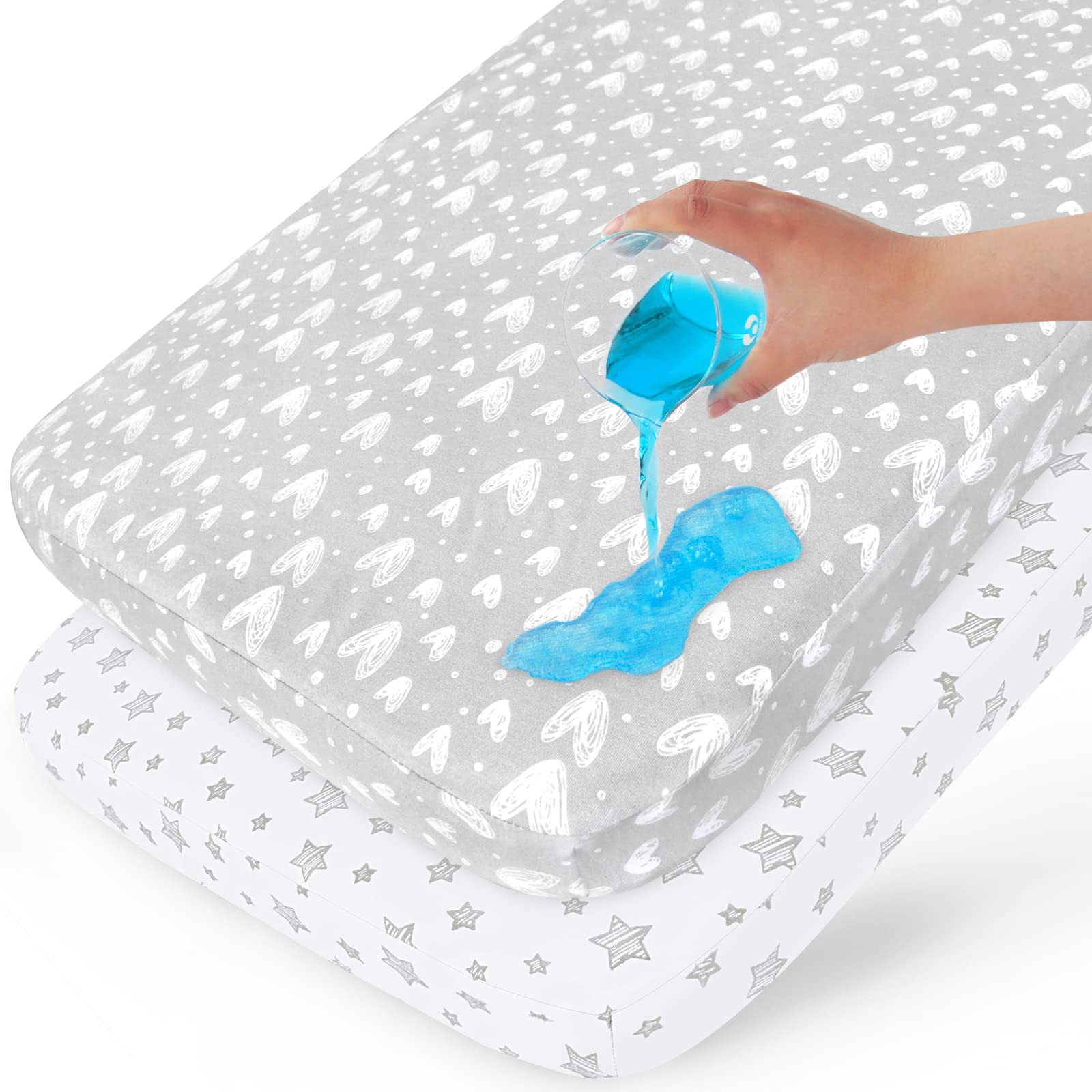Biloban waterproof crib mattress protector on a crib mattress showing spill protection